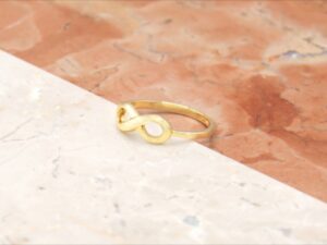 Anello oro giallo simbolo infinito